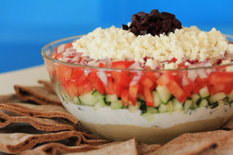 Mediterranean Layer Dip with Toasted Pita Triangles