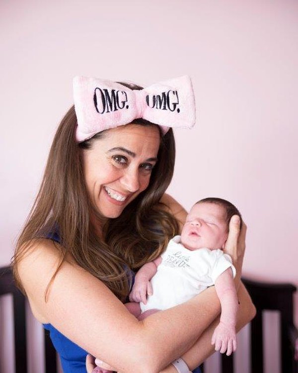 Devin Alexander holding her newborn daughter Cayenne