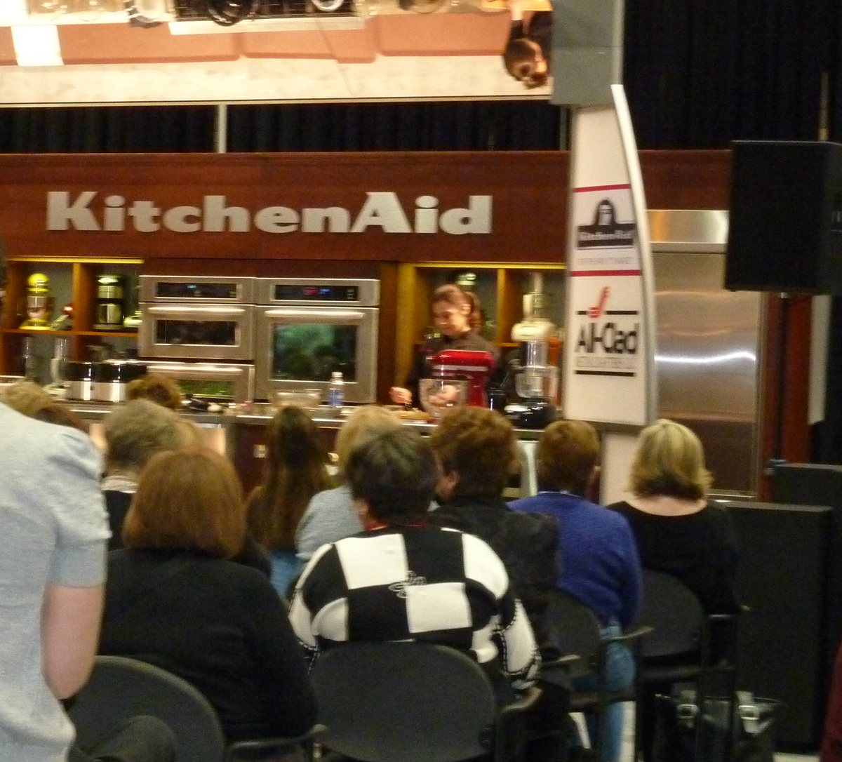 Devin Alexander presenting on the KitchenAid main stage at the International Home + Housewares Show